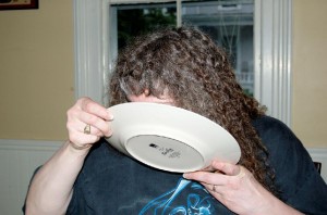 Image of woman licking her plate clean