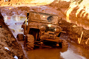 image of jeep stuck in mud